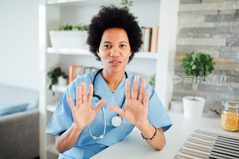 Portrait of an African American female doctor in her office